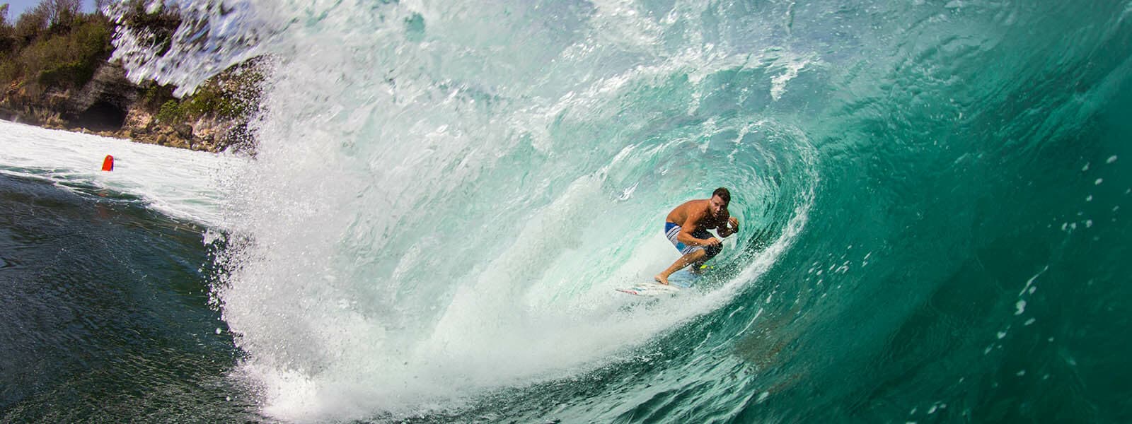 Ryan Ragan surfing inside a barrel